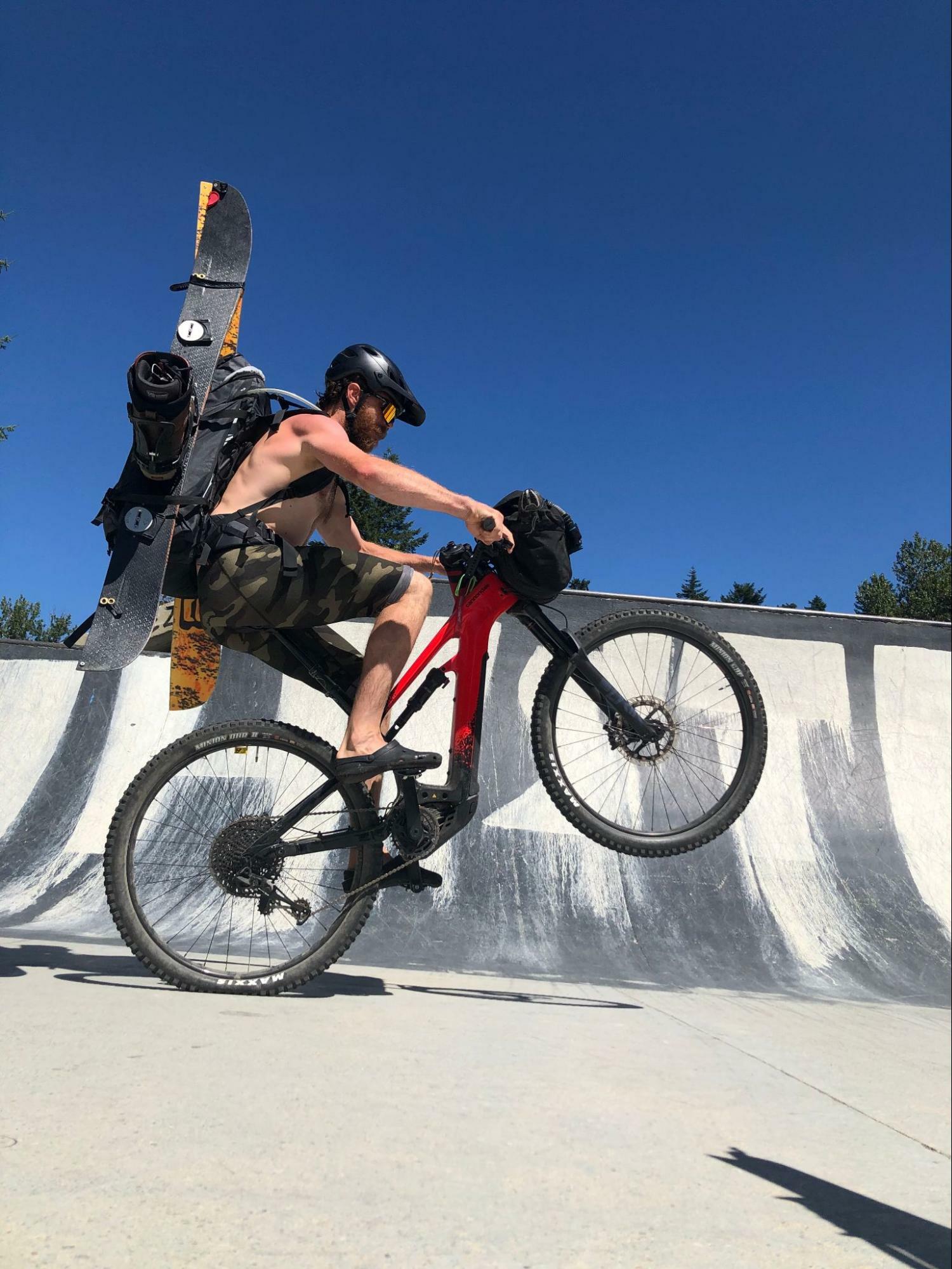 Bikepacking wheelie in the skatepark