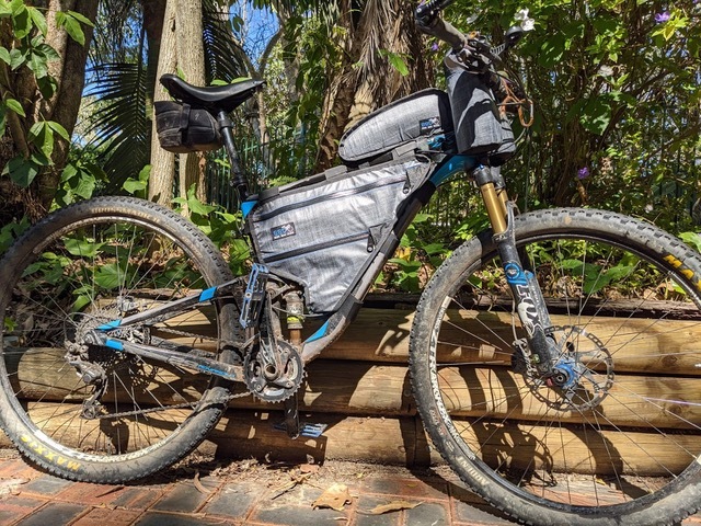 Bikepacking frame bag for a dual suspension mountain bike made by Bike Bag Dude
